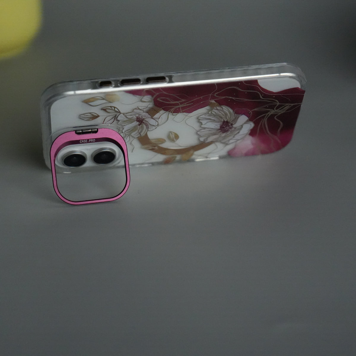 iPhone 16 FloraCrystal Clear Floral Design Case with Color Metal Camera Stand Frame