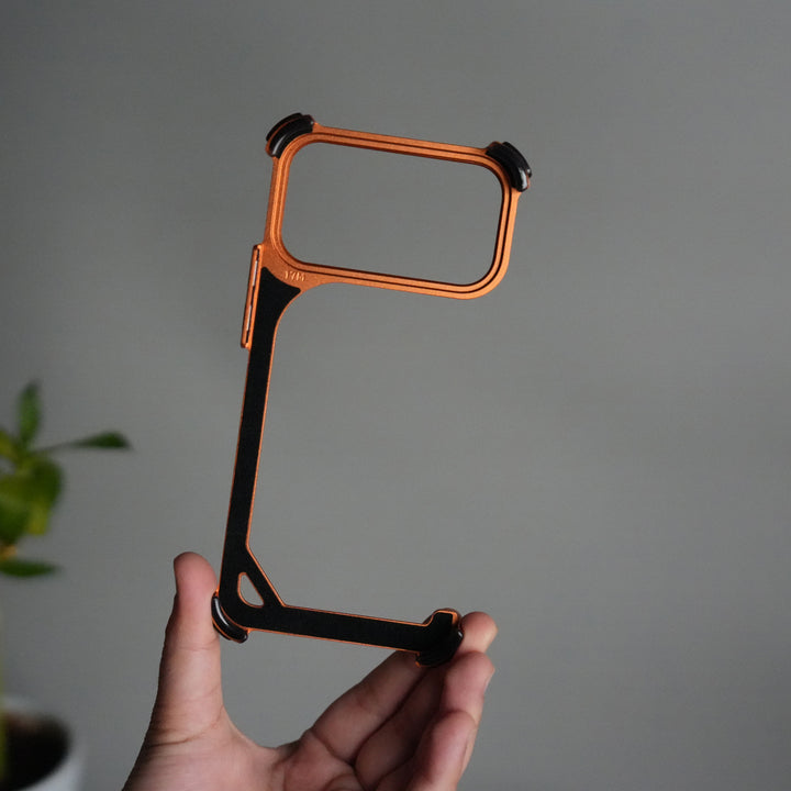 iPhone 17 Pro 9-Shaped Frameless Metal Bumper Case with Hidden Lens Stand | Shockproof Aviation-Grade Alloy Frame