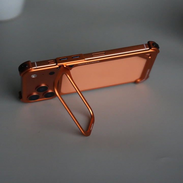 iPhone 17 Pro 9-Shaped Frameless Metal Bumper Case with Hidden Lens Stand | Shockproof Aviation-Grade Alloy Frame