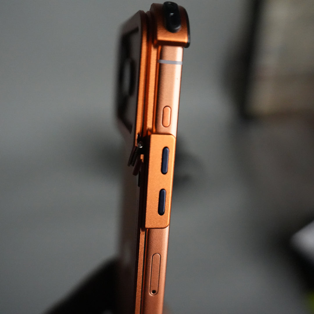 iPhone 17 Pro 9-Shaped Frameless Metal Bumper Case with Hidden Lens Stand | Shockproof Aviation-Grade Alloy Frame