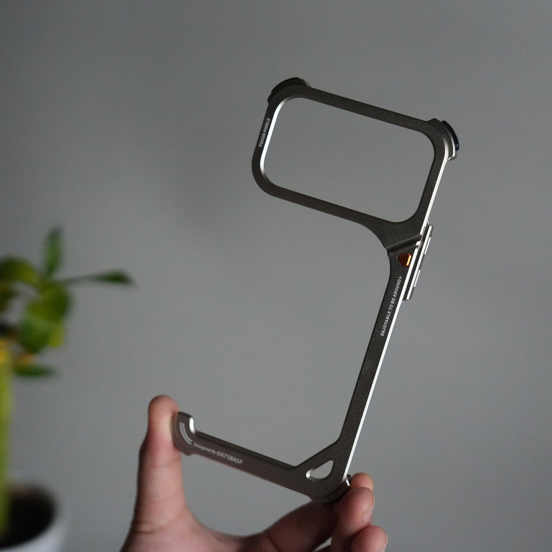 iPhone 17 Pro 9-Shaped Frameless Metal Bumper Case with Hidden Lens Stand | Shockproof Aviation-Grade Alloy Frame