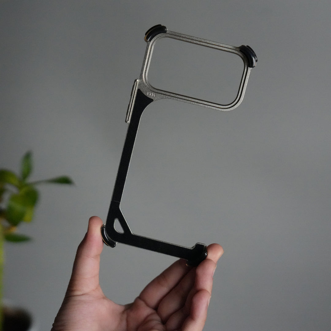 iPhone 17 Pro 9-Shaped Frameless Metal Bumper Case with Hidden Lens Stand | Shockproof Aviation-Grade Alloy Frame
