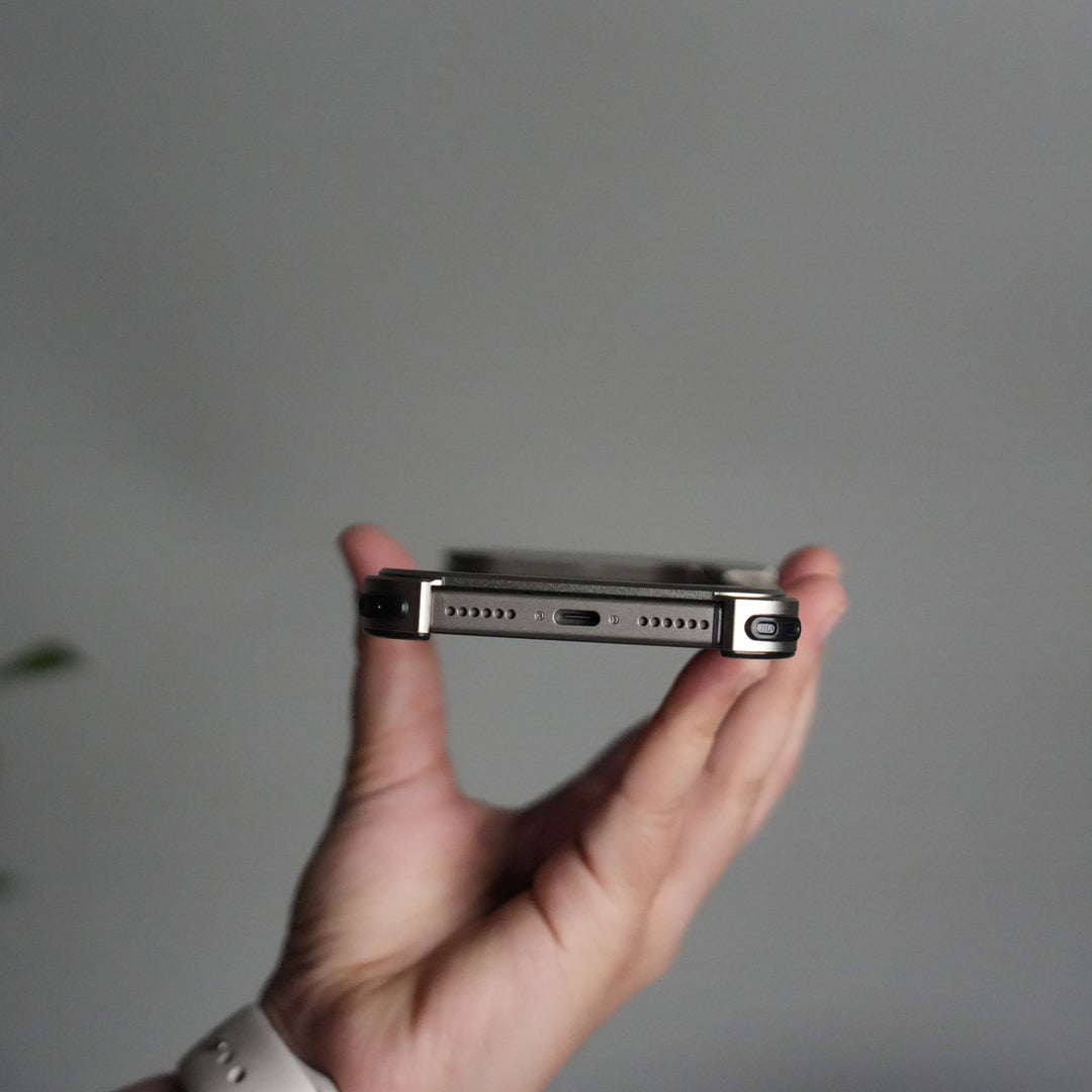 iPhone 17 Pro 9-Shaped Frameless Metal Bumper Case with Hidden Lens Stand | Shockproof Aviation-Grade Alloy Frame