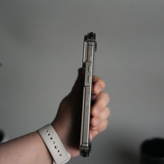 iPhone 17 Pro 9-Shaped Frameless Metal Bumper Case with Hidden Lens Stand | Shockproof Aviation-Grade Alloy Frame