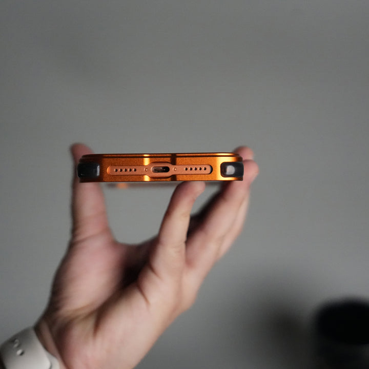 iPhone 17 Series Kevlar Fiber Texture Frameless Metal Kickstand Case | Orange