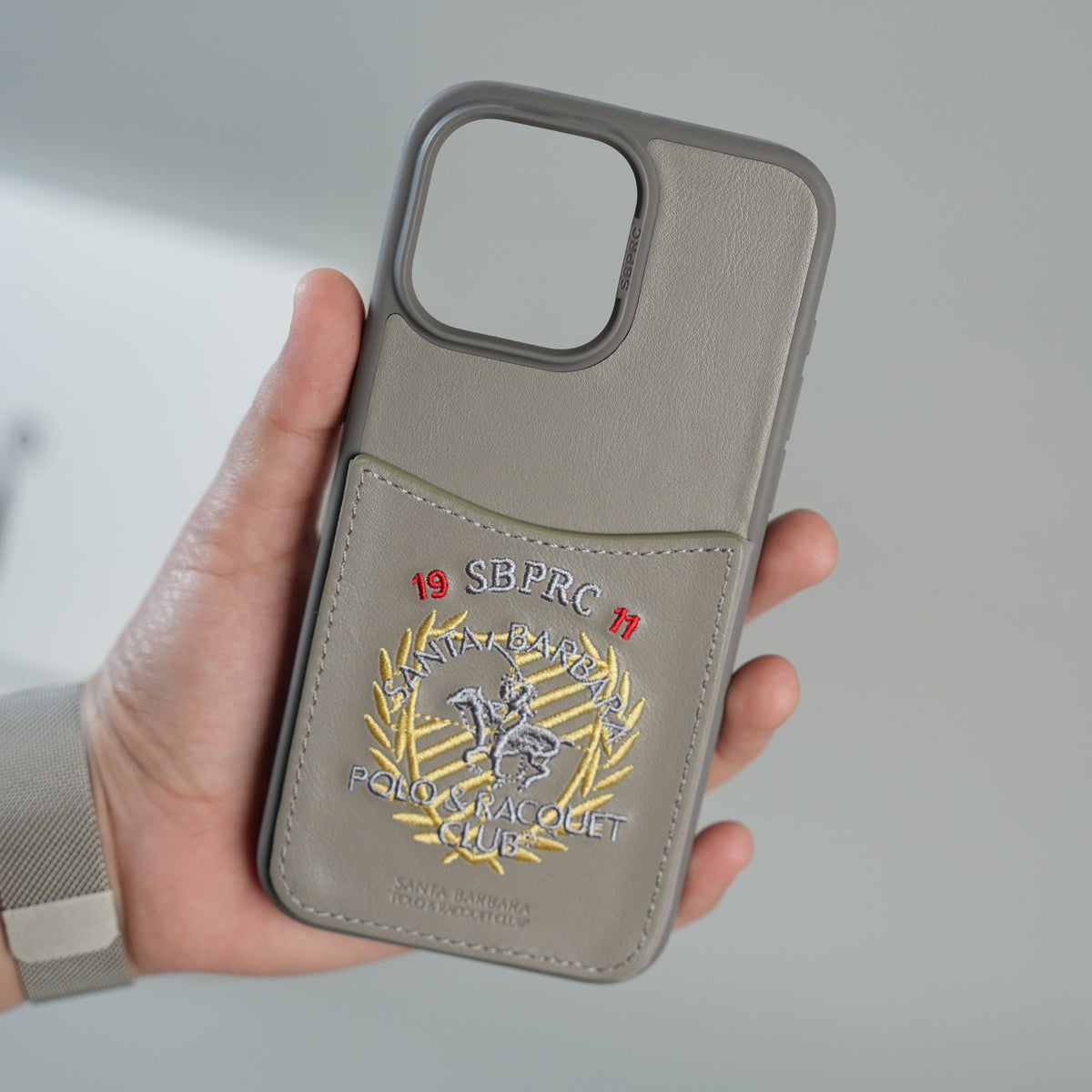 iPhone 15 Series Premium Leather Card Holder Case with Stitched Crest Design