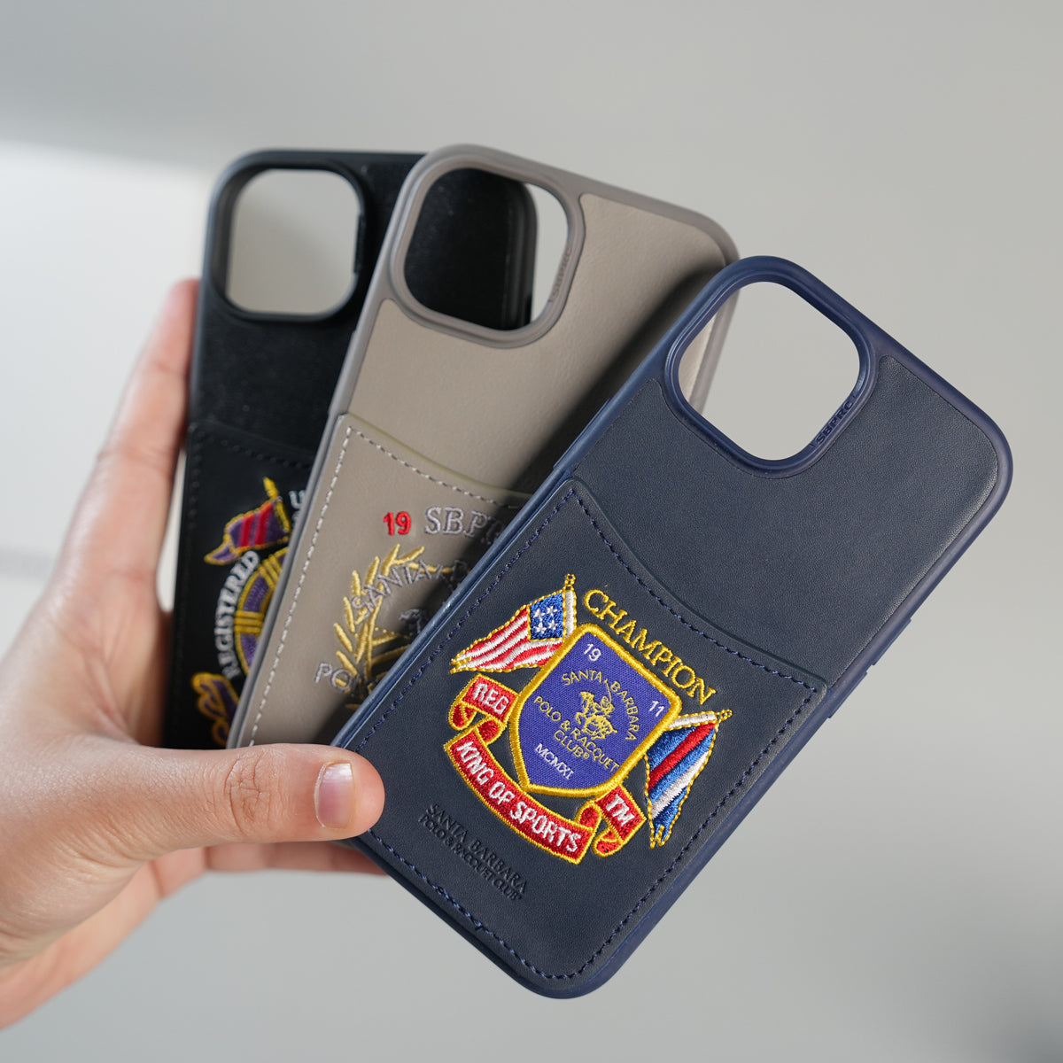 iPhone 15 Series Premium Leather Card Holder Case with Stitched Crest Design