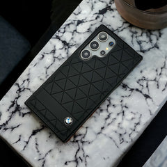 Samsung Galaxy S24 Ultra Traingular Pattern PU Leather Sports Car Logo Case Cover (Black)