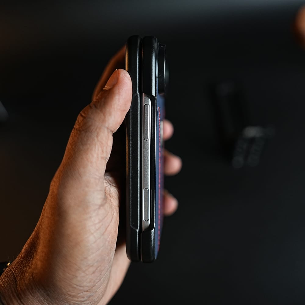 Racing-Inspired Leather-Texture Case for iPhone Duo | Sporty Stitching & Shield Emblem Design