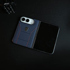 Racing-Inspired Leather-Texture Case for iPhone Duo | Sporty Stitching & Shield Emblem Design