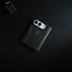 Racing-Inspired Leather-Texture Case for iPhone Duo | Sporty Stitching & Shield Emblem Design