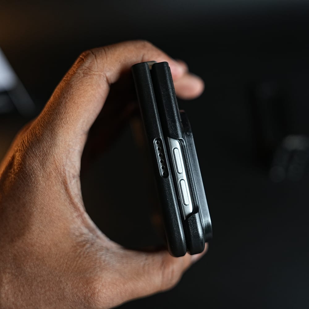 Racing-Inspired Leather-Texture Case for iPhone Duo | Sporty Stitching & Shield Emblem Design