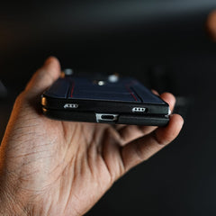 Racing-Inspired Leather-Texture Case for iPhone Duo | Sporty Stitching & Shield Emblem Design